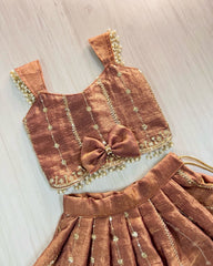 Designer Girls Metallic Rust Silk Lehenga Choli with Bow Accent & Pearl Lace Details