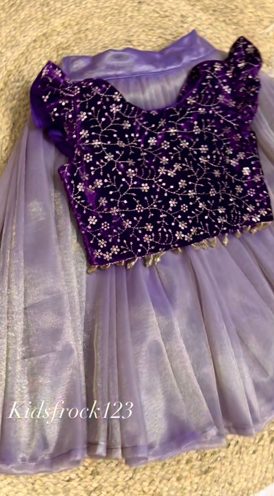 Festive Radiance: Girls' Purple Velvet Floral Sequinned Top & Lavender Twill Net Lehenga Set